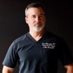 Dr. Jason Champagne